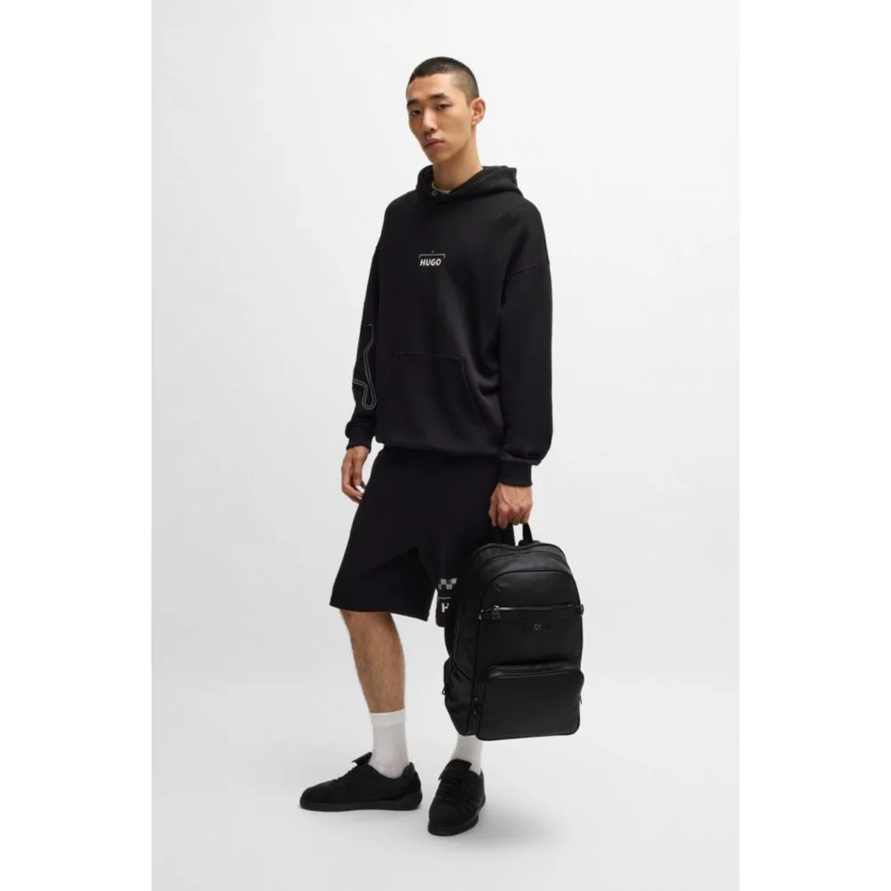 Grained faux-leather backpack with stacked-logo trim