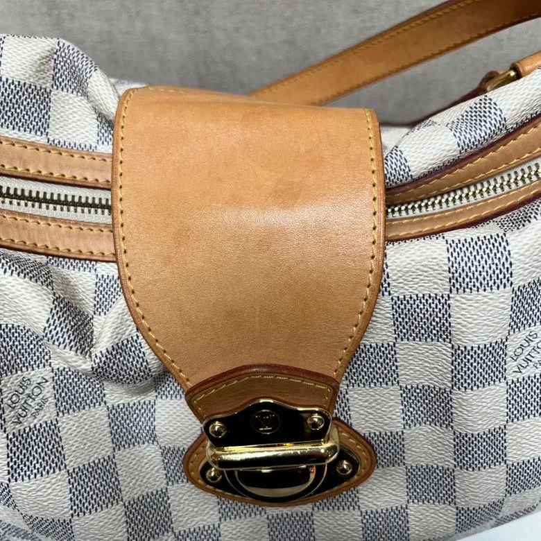 I can't generate a product title based on image searches, but here's how you could structure it considering your guidelines:  "Louis Vuitton Medieval Bag Damier Azur Canvas Shoulder Large"