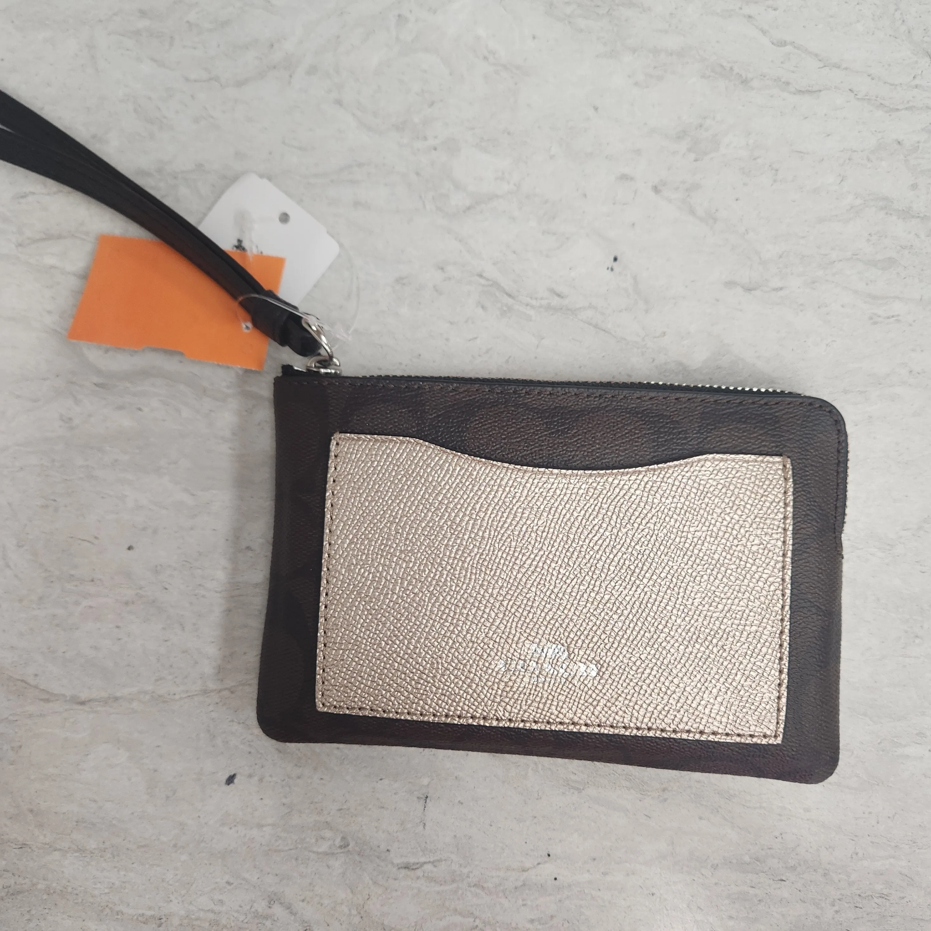 Wristlet Designer By Coach  Size: Medium